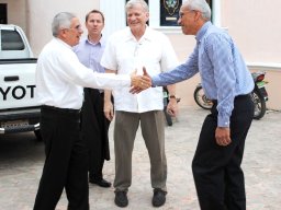 monsenor jose dolores grunon bishop of the southern region of the dr welcomes representatives of the canadian embassy  goldquest